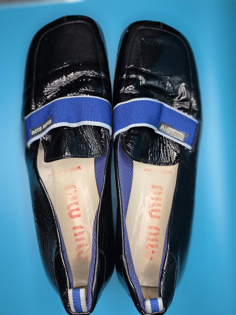 Miu Miu Black Patent Loafers with Blue Ribbon Accent